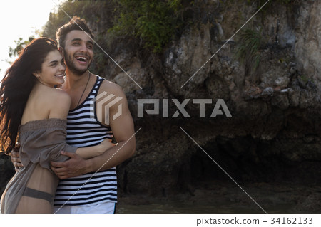 Couple On Rock Beach Summer Vacation, Beautiful Couple On Rock Beach Summer Vacation, Beautiful 34162133