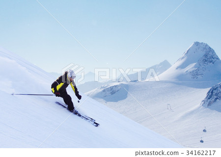 Skier in high mountains Skier in high mountains 34162217