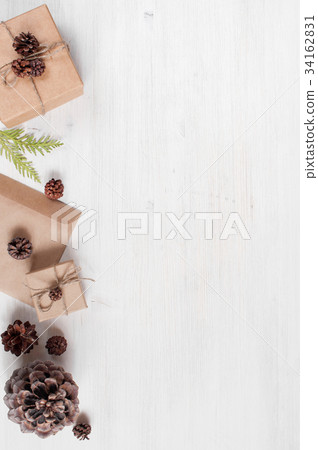Light holiday background with craft gift boxes Light holiday background with craft gift boxes 34162831