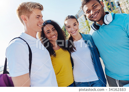 Horizontal picture of happy students that having Horizontal picture of happy students that having 34162883