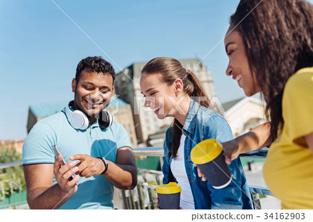 Positive girls laughing from funny joke 34162903