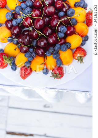 Plait with strawberry, blueberry, sweet cherry Plait with strawberry, blueberry, sweet cherry 34163252