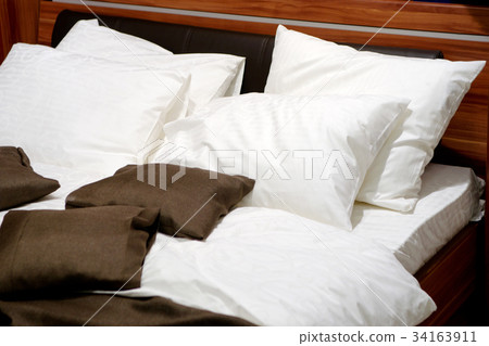 Nice pillows on a contemporary bed Nice pillows on a contemporary bed 34163911