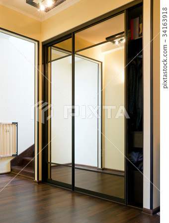 Mirror case in home vestibule Mirror case in home vestibule 34163918