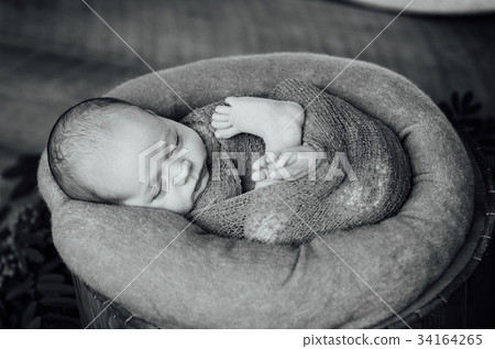 newborn sleeping baby boy with knitted hat newborn sleeping baby boy with knitted hat 34164265