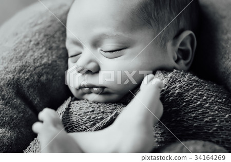 newborn sleeping baby boy with knitted hat newborn sleeping baby boy with knitted hat 34164269