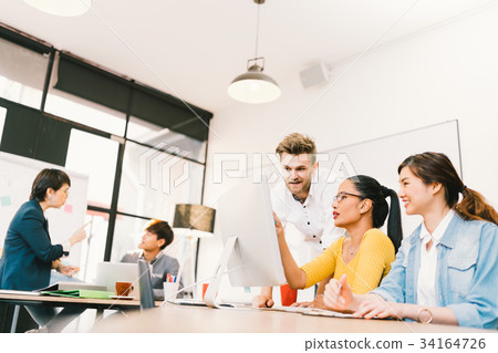 Diverse group of creative office people at work 34164726