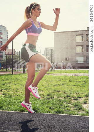 jumping at outdoor 34164763