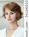 Portrait of beautiful young girl 34166010
