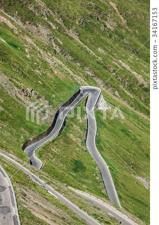 serpentine mountain road in Italian Alps, Stelvio serpentine mountain road in Italian Alps, Stelvio 34167153