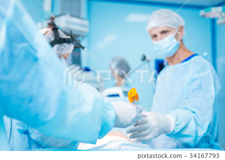 Close up of male hand that holding instrument 34167793