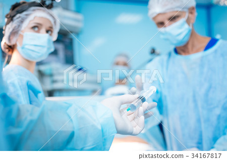Focused photo on male hand that holding prick 34167817