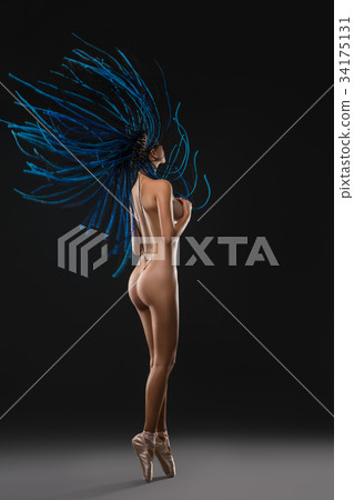 Dreadlocks nude girl rearview photo against wall 34175131