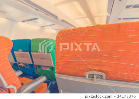 Airplane seat with in cabin of huge aircraft Airplane seat with in cabin of huge aircraft 34175370