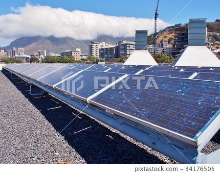 Solar panels or Solar cells on rooftop. Solar panels or Solar cells on rooftop. 34176505