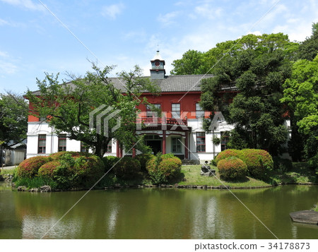 Former Tokyo Medical School Main Building (The University of Tokyo General Research Museum Koishikawa Branch) viewed from the Japanese garden of Koishikawa Botanical Garden 34178873