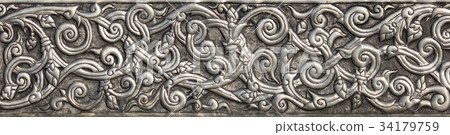 Pattern of silver metal plate with flower carved 34179759