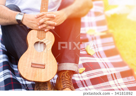 Male Musician holding an Ukulele Relax 34181892