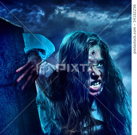 Undead zombie scary girl on halloween graveyard Undead zombie scary girl on halloween graveyard 34182256