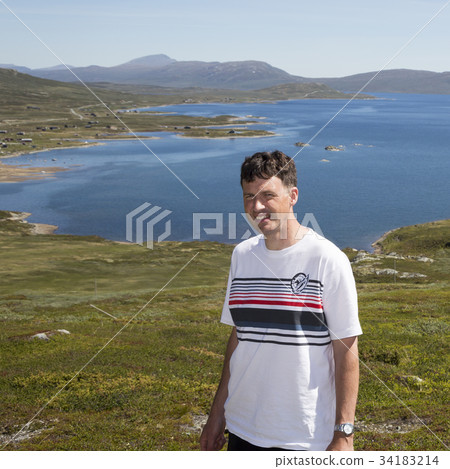 Male tourist at Valdresflye (Norway) Male tourist at Valdresflye (Norway) 34183214