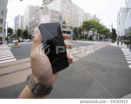 Have a smartphone in the city (Authentic & POV expression) 34183423
