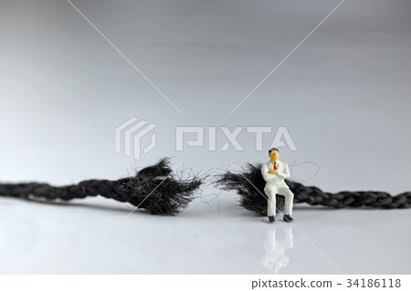 Broken rope and businessman Broken rope and businessman 34186118