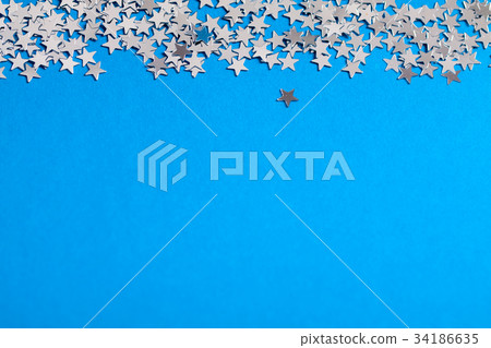 Frame of scatters little silver stars on blue. Frame of scatters little silver stars on blue. 34186635