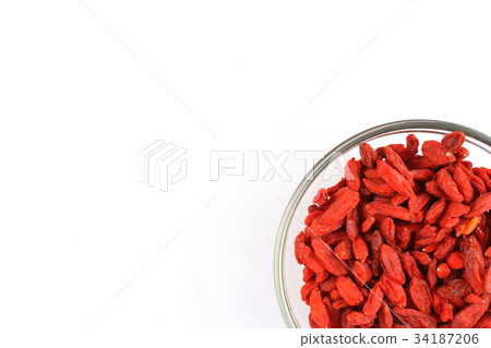 dried goji berries in a small glass bowl 34187206