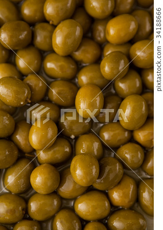 Close up of olives in jar by food Close up of olives in jar by food 34188666