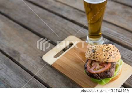 Close-up of hamburger and french fries in take way bag 34188959