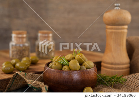 Tilt image of olives with red chili pepper Tilt image of olives with red chili pepper 34189066