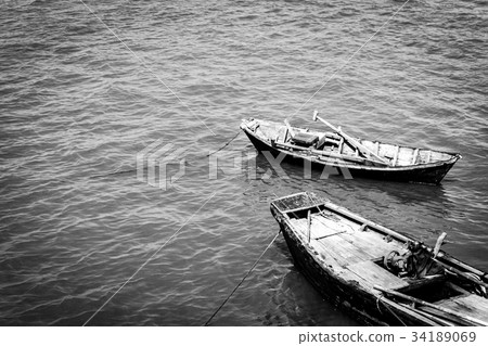 Two boat anchor on pier. Black and white Two boat anchor on pier. Black and white 34189069