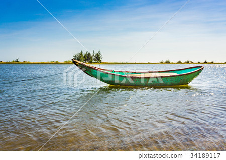 Alone boat in the river Alone boat in the river 34189117