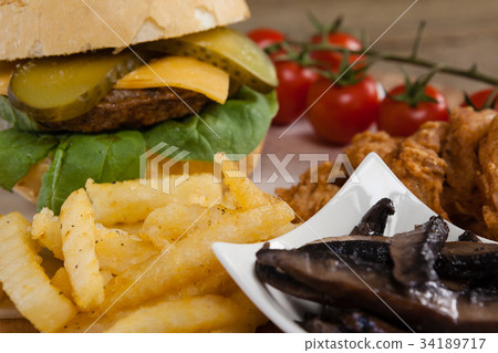 Hamburger on chopping board 34189717