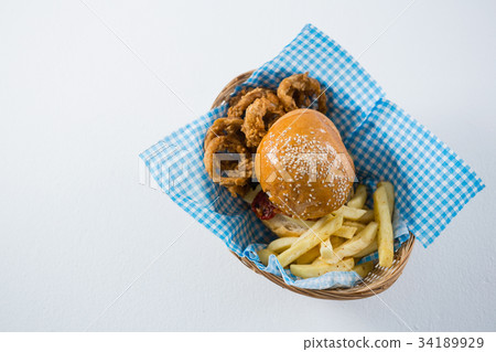 Close up of cheeseburger with sesame seeds Close up of cheeseburger with sesame seeds 34189929