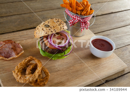French fried chips in a take away container French fried chips in a take away container 34189944