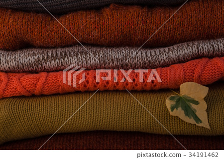 American football jersey and football lying on green board with strategy drawn on it American football jersey and football lying on green board with strategy drawn on it 34191462