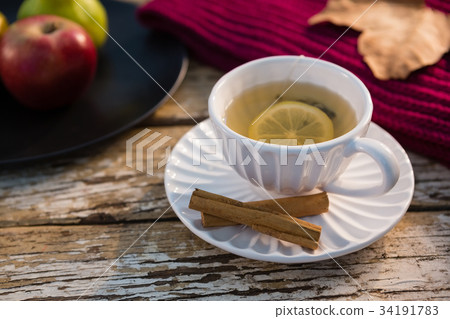 Overhead view of pine cone and dried leaves Overhead view of pine cone and dried leaves 34191783