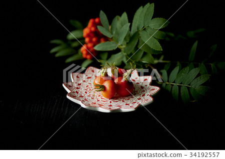 Useful antioxidant rosehip and lying on a platter Useful antioxidant rosehip and lying on a platter 34192557