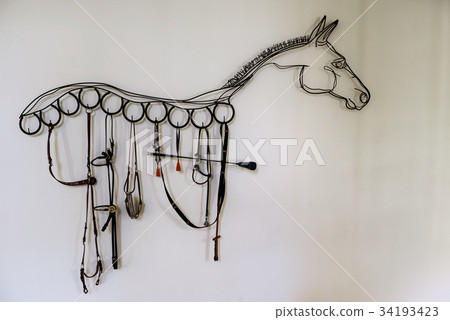 Horse shape decoration made by bridle 34193423