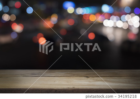Empty wooden table platform and bokeh at night Empty wooden table platform and bokeh at night 34195218