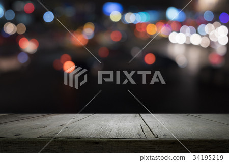 Empty wooden table platform and bokeh at night 34195219