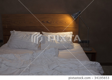 Bedroom with desk lamp Bedroom with desk lamp 34195653