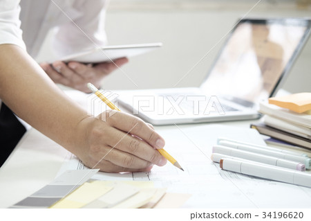 Engineer working for architectural project. Engineer working for architectural project. 34196620