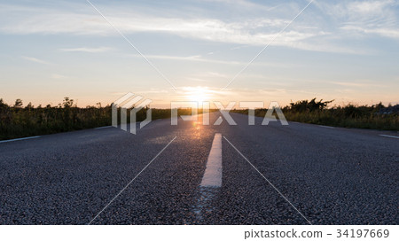 Extreme low angle view at an asphalt road Extreme low angle view at an asphalt road 34197669