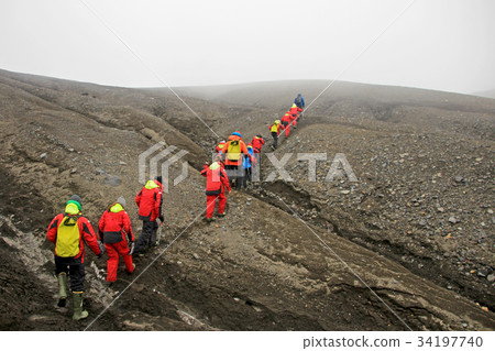 Group of people hiking at Deception Island Group of people hiking at Deception Island 34197740