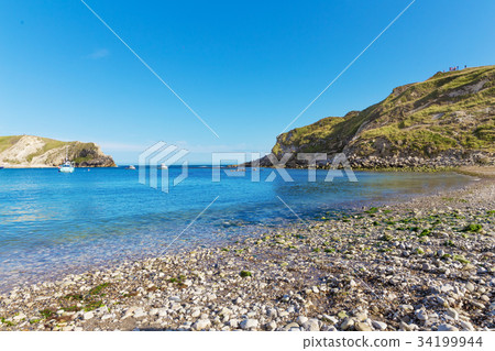 Lulworth Cove Atlantic ocean coast Dorchester UK 34199944