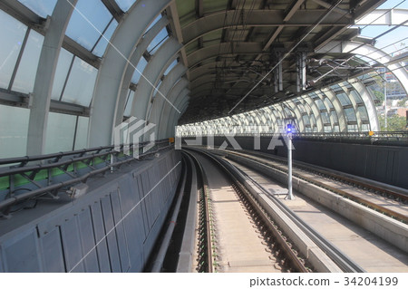 Monorail passing though the tunnel 34204199
