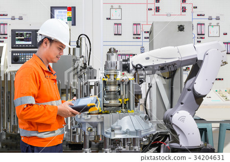 Engineer programing automated robotic industry  34204631