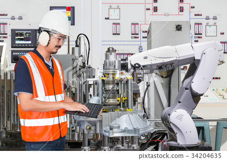 Engineer use computer maintenance robotic industry Engineer use computer maintenance robotic industry 34204635